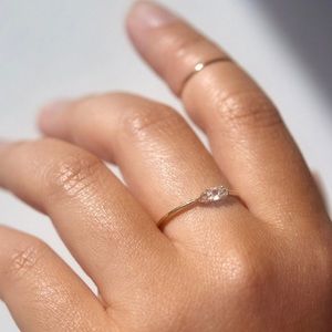 Slumburous Light white diamond ring